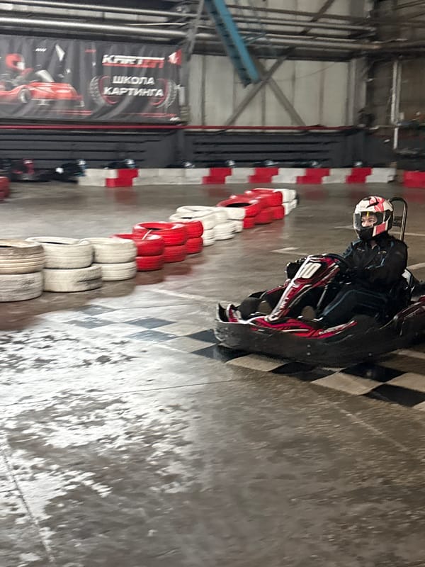 Indoor go-kart racing session captured at Perm facility