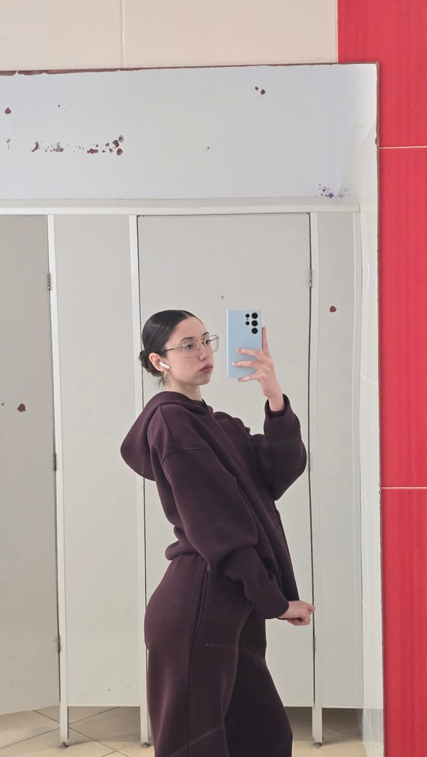 Museum visitor takes selfies with Russian artifact displays
