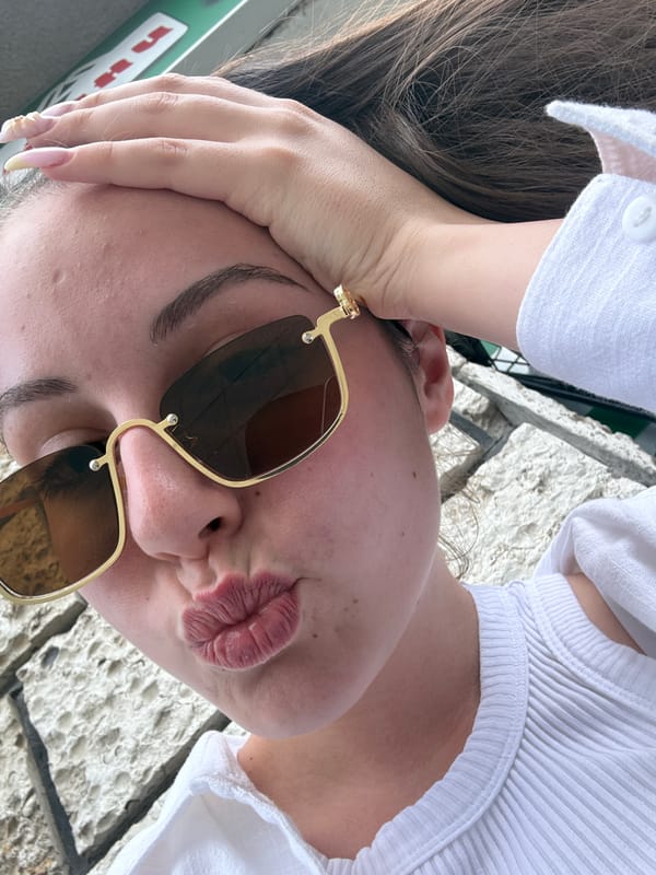 Woman takes selfies with elaborate nails in Burgas