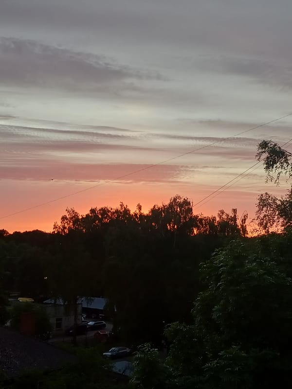 Vibrant sunset observed over Riga during evening twilight hours