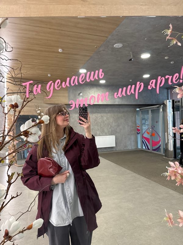 Woman shops for clothing and accessories in Izhevsk store