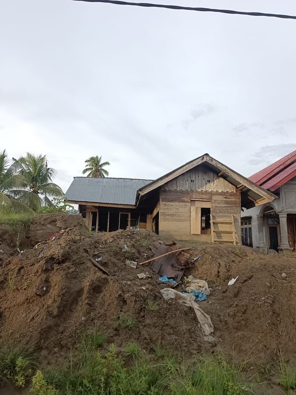 Landslide damage across a village in Meunasah Raya, Indonesia