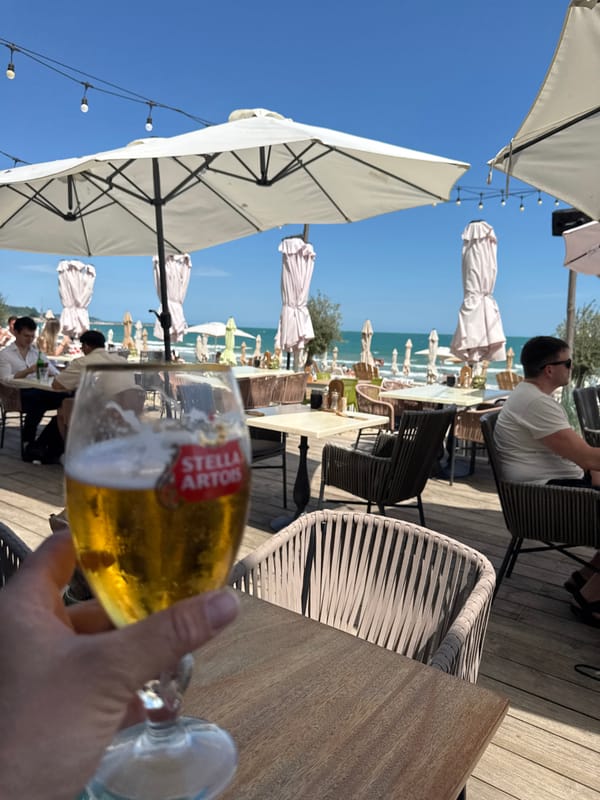 Cold Stella Artois at a Black Sea beachside table, Varna