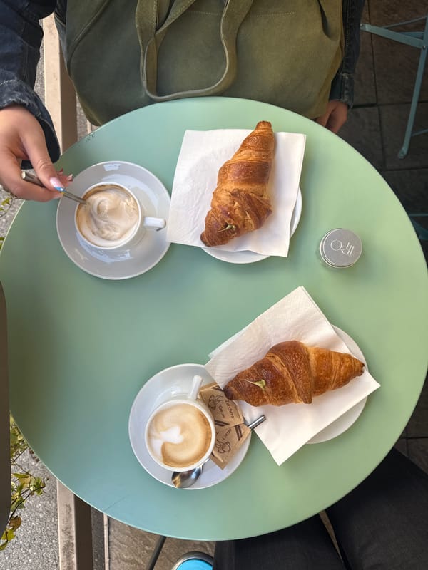 Morning café breakfast shared in Milan outdoor setting