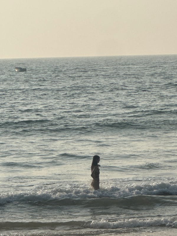 Beach day captured at Sinquerim, Goa with swimming and relaxation