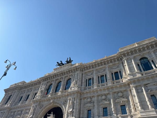 Ordinary street life documented near Rome's Palace of Justice