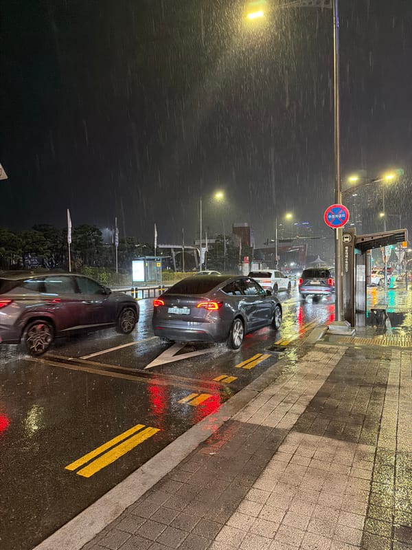 Heavy rain falls on Busan street at night