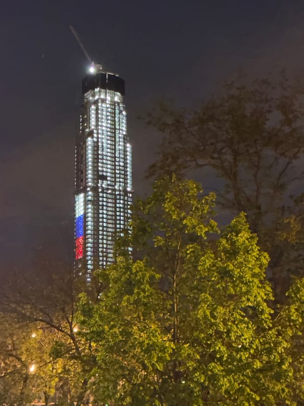 Moscow Evening: Skyscraper Lights, Indoor Meditation, Urban Greenery
