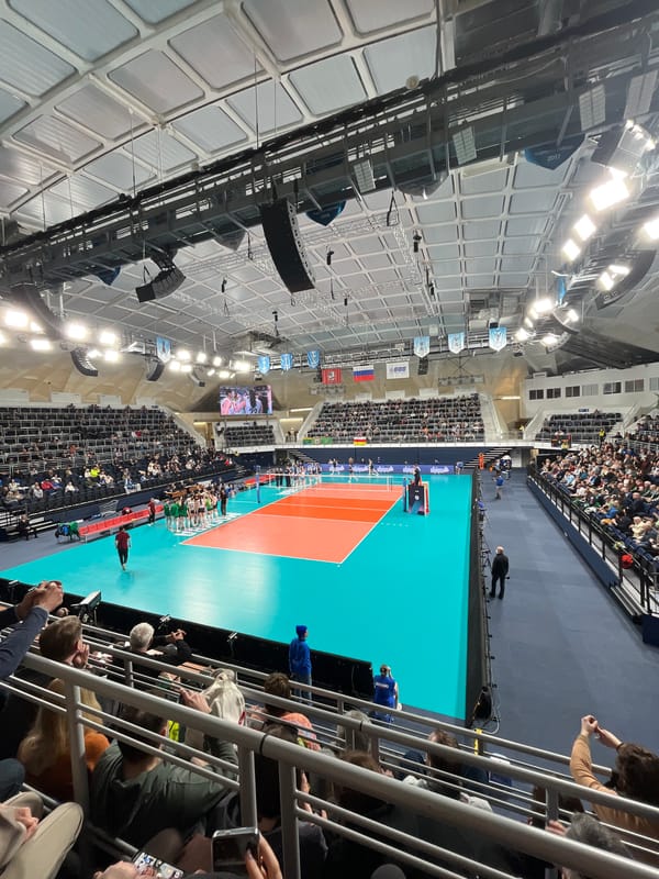Volleyball match played between blue and red teams in Moscow