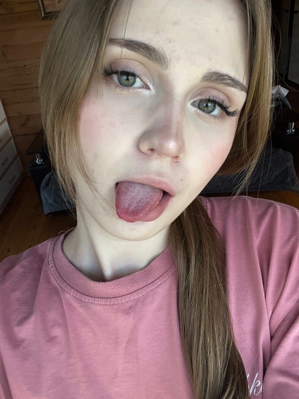 Selfie session in a rural Russian home, pink shirt, multiple poses