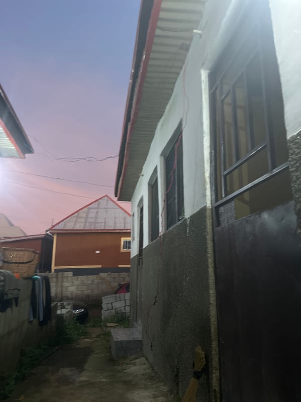 Urban dawn documentation: man in alley during twilight hours