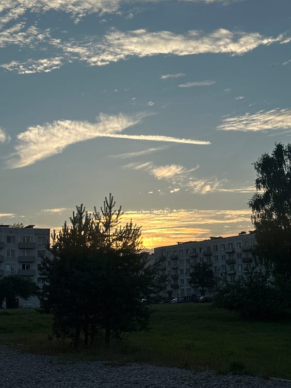 Liepāja evening: sunset light, pine roads, and Soviet-era skyline