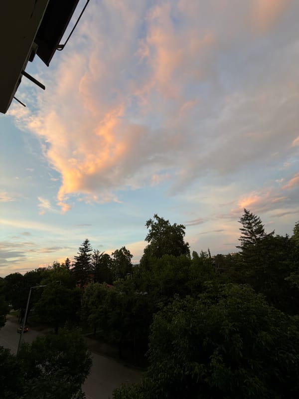 Twilight sky with rainbows observed from elevated position