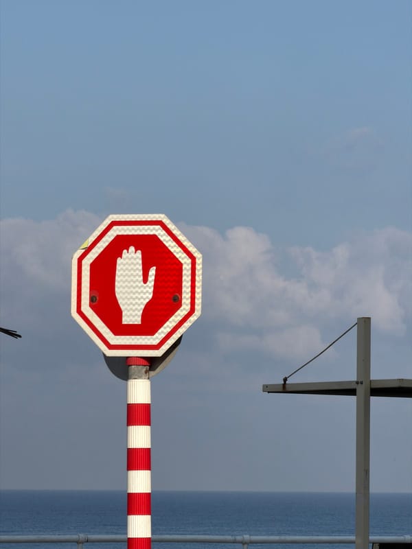 Street-level stop sign with hand symbol, Bat Yam, Israel