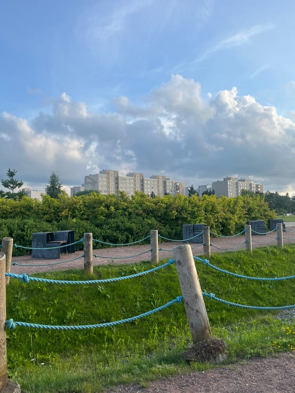 Rope obstacle course and green pathways in a Tallinn park