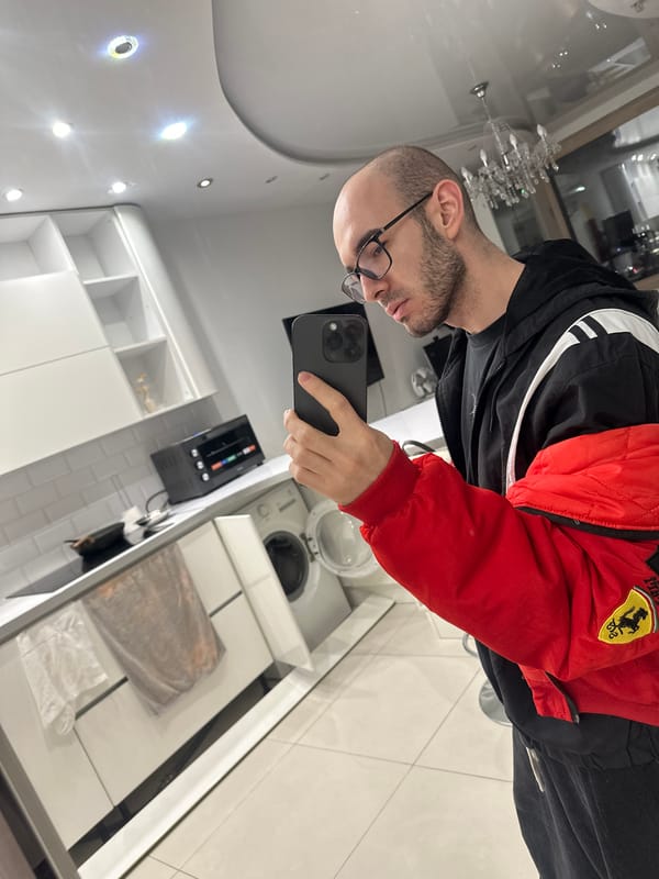 Man documents kitchen scene with phone in Khimki