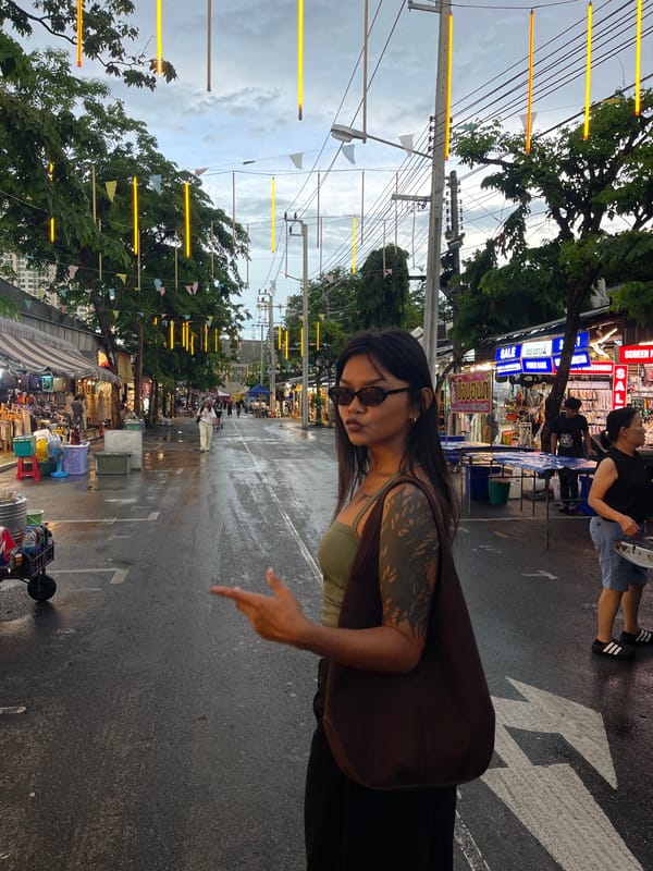 Street market and motorcycle POV scenes from central Bangkok