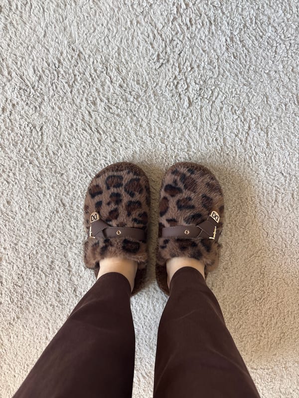 Person in leopard slippers spotted on carpet in Bulgaria