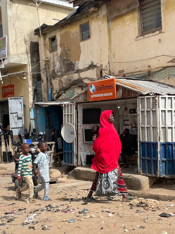 Everyday street life documented across Jos, Nigeria commercial district