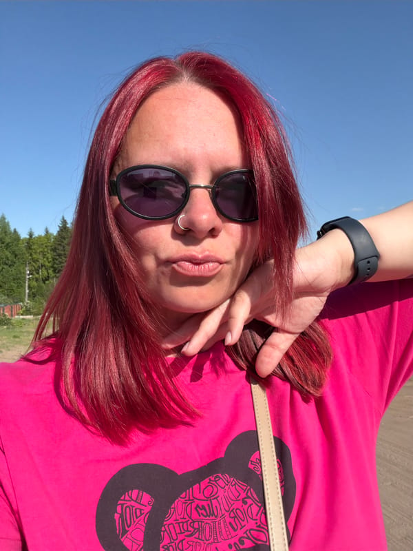 Woman takes outdoor selfies in sunny Chaikovsky, Russia