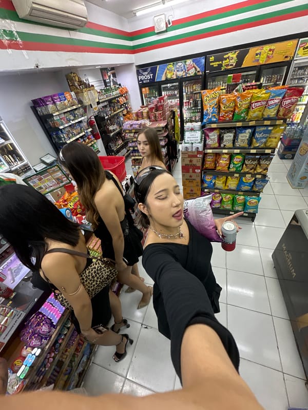 Young women shop, pose for photos at North Kuta convenience store