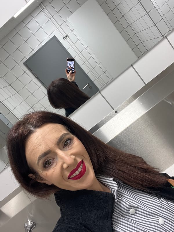 Woman takes selfies in bathroom and on lockers