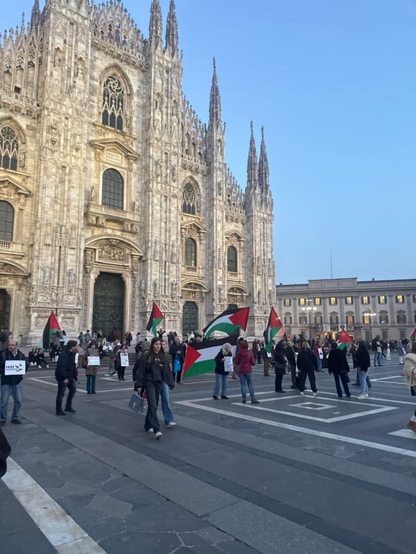 Tourist captures Milan's iconic landmarks during evening hours