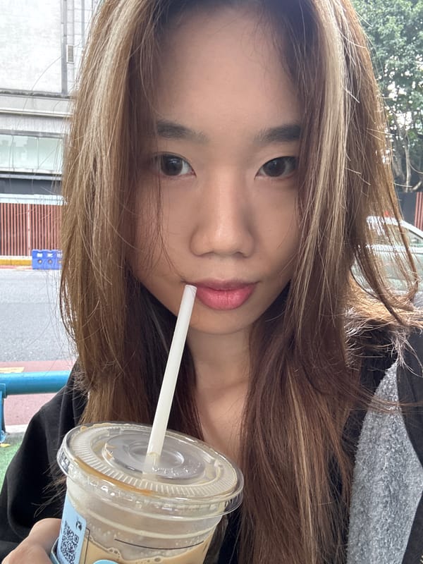 Woman takes morning selfies with coffee in Shapingba District