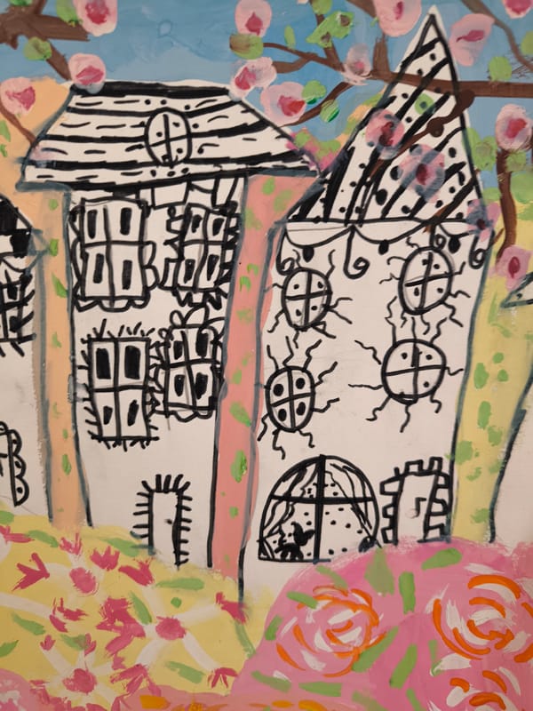 Amateur art displays spotted in Riga featuring house painting, paper flowers