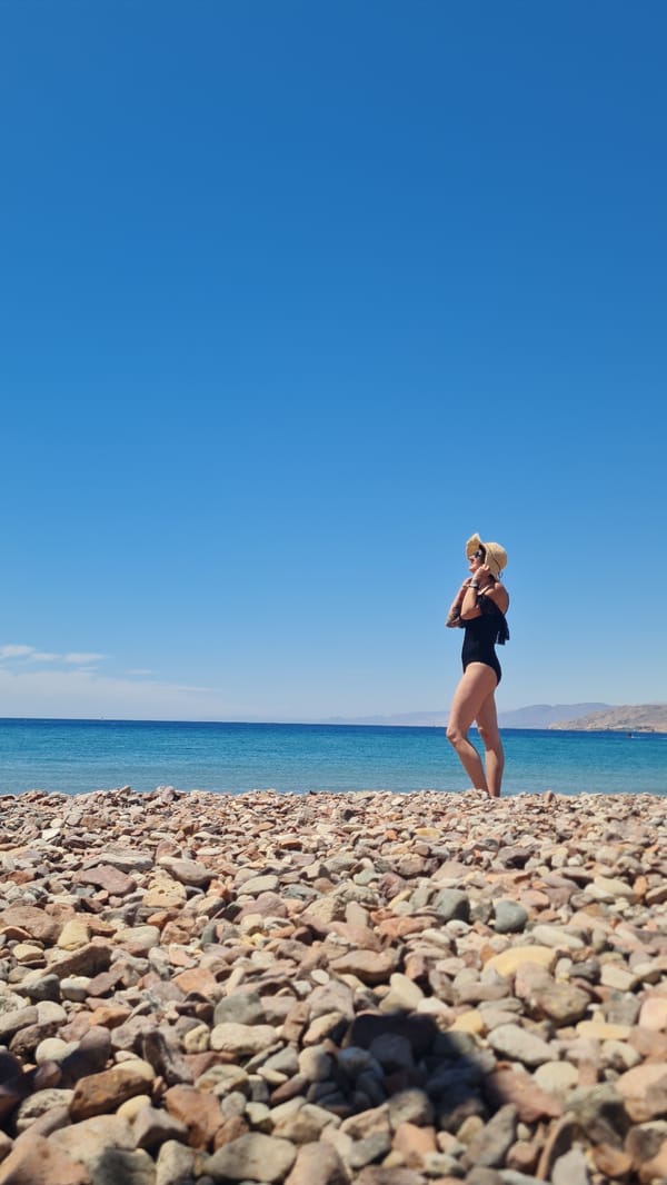 Woman enjoys morning beach moments in Eilat, Israel