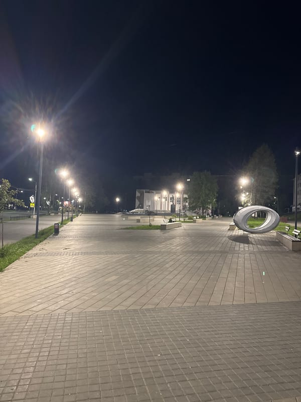 Nighttime scenes documented in Chaikovsky, Russia include portraits, empty spaces