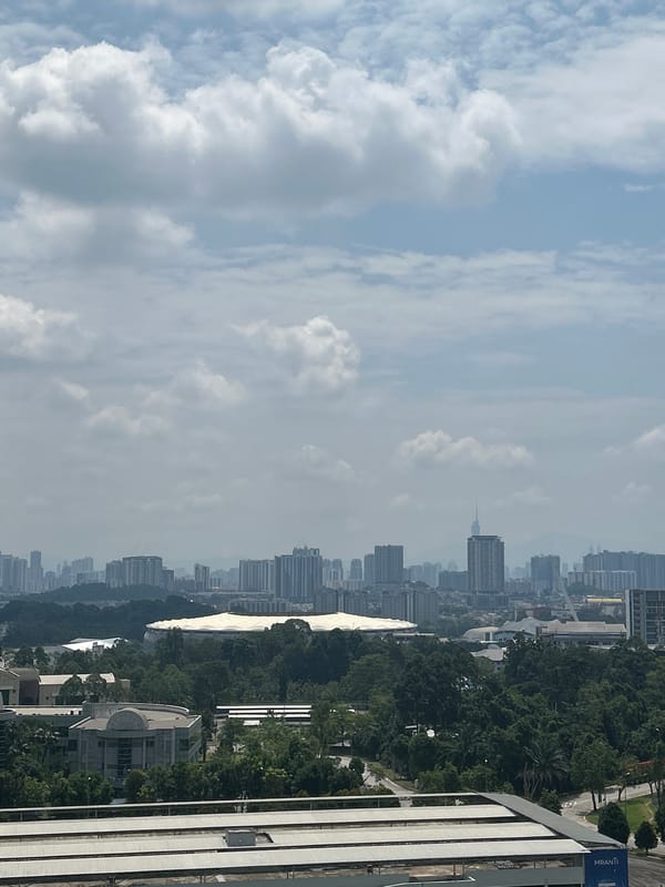 Morning cityscape views documented from elevated Kuala Lumpur building