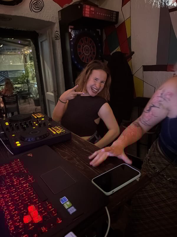 Female DJ performs at crowded Podgorica bar Friday evening