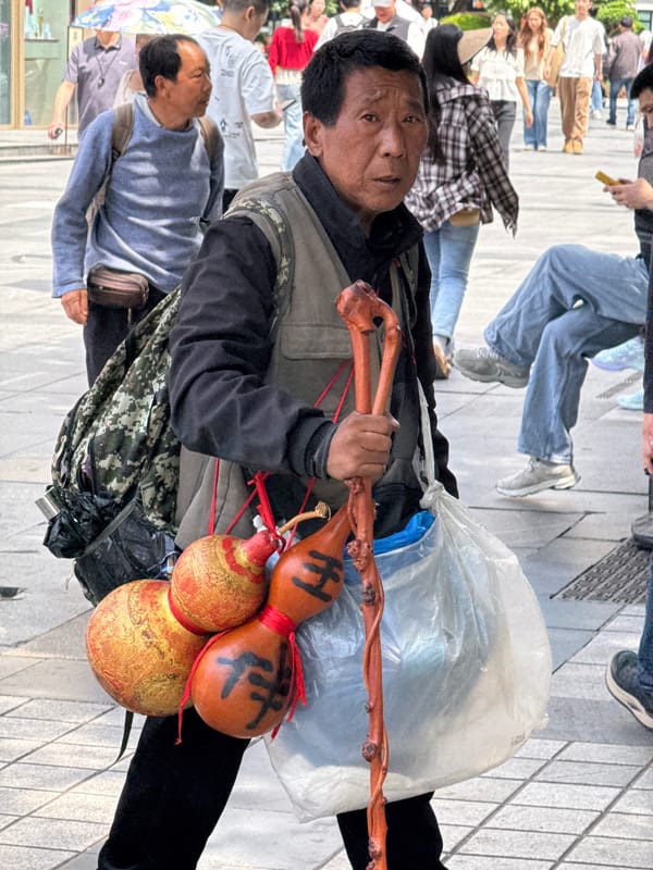 Morning pedestrians photographed in Yuzhong District walkway
