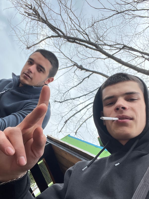 Two young men take selfie in Sopot, Bulgaria