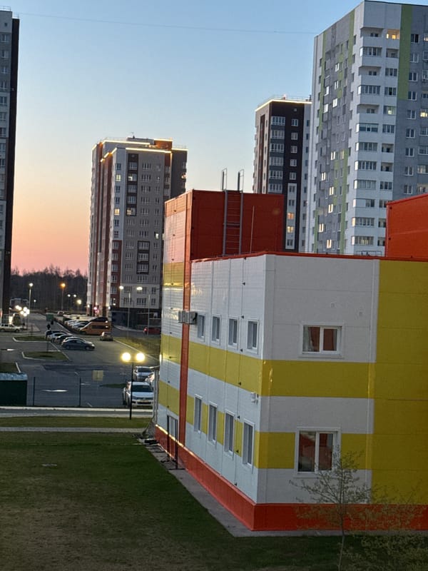 Tobolsk residential area with colorful buildings documented at dusk