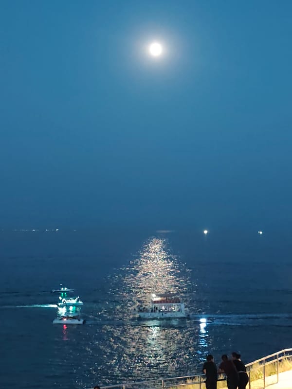 Live concert on Aktau's Caspian waterfront under a full moon
