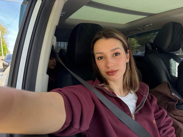 Woman Takes Rotated Car Selfie Morning April 29