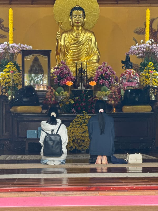 Prayer and strolling at a Buddhist temple in Da Lat