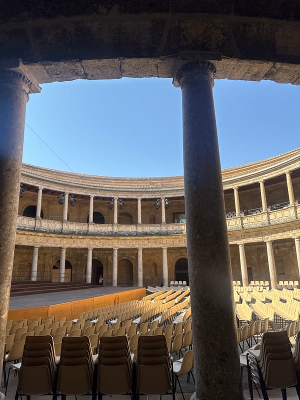 Morning walkthrough of the Alhambra's courtyards, towers, and stonework