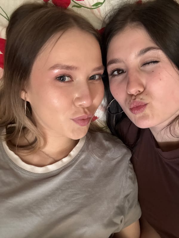 Young women take playful selfies in Foki, Russia