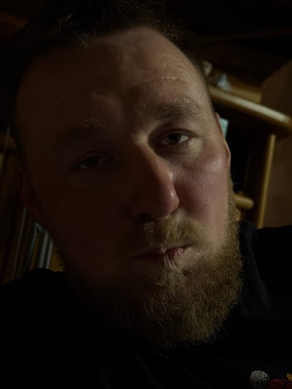 Bearded man photographed in close-up in Nizhnyaya Chermoda, Russia