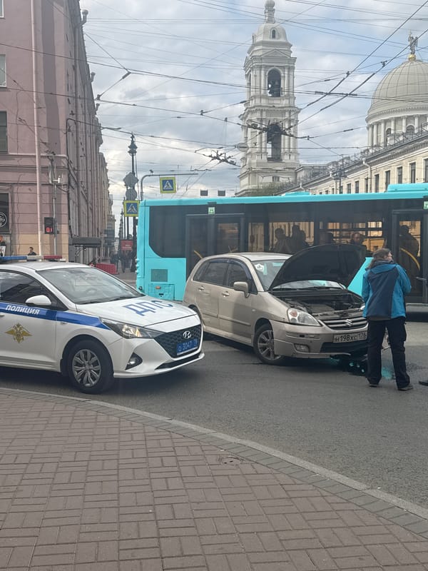 Ordinary Tuesday morning unfolds across Saint Petersburg streets and waterways