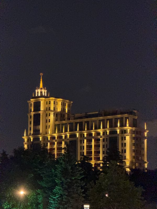 Moscow night: Stalinist skyline meets outdoor soccer viewing