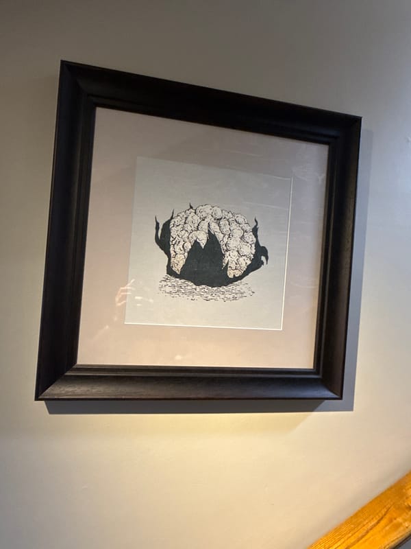 Visitor documents wall art collection in Great Yarmouth home