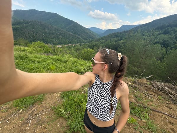 Hikers explore mountainous region during afternoon outdoor excursion