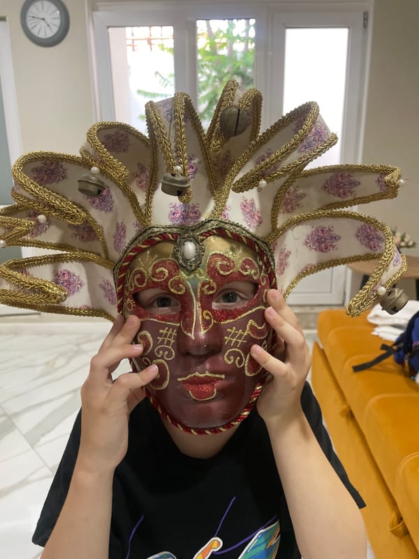 Ornate Venetian jester mask on display in Anapa