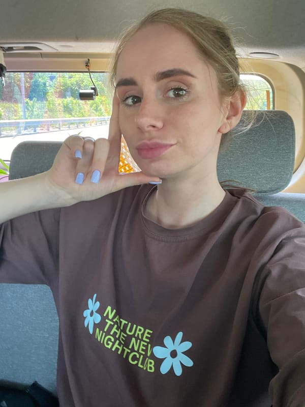 Woman takes selfie in vehicle in Vladivostok