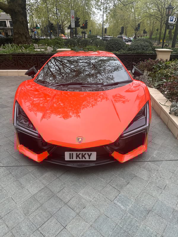 Orange Lamborghini spotted parked on London sidewalk