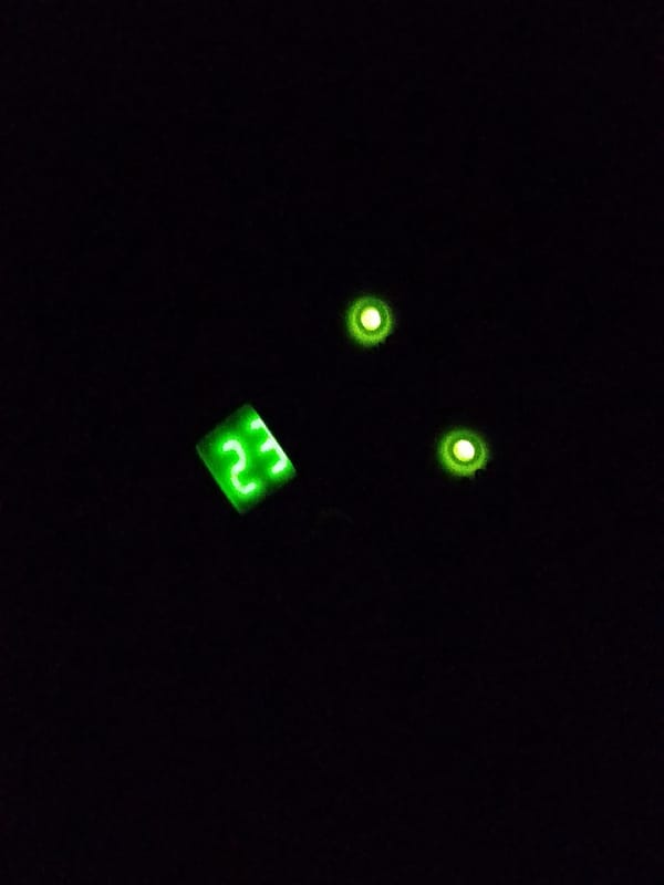 Green digital display showing '23' observed in Santa Ana